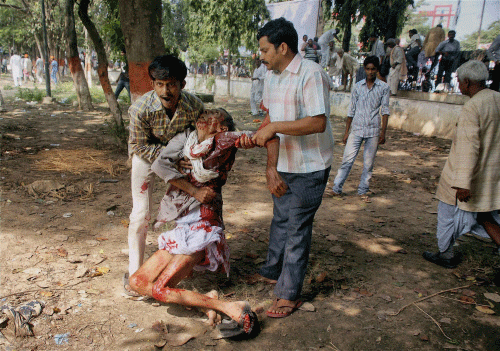 An injured person after bomb blast before BJP's Hunkar rally in Patna on Sunday. PTI Photo