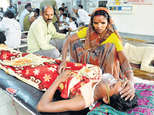 Bomb blast victims receive treatment in Patna Medical College Hospital on Monday. PTI