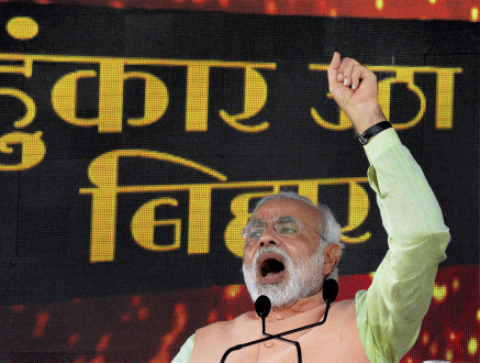 Gujarat Chief Minister and BJP's Prime Ministerial candidate Narendra Modi addressing at the Hunkar rally in Patna on Sunday. PTI Photo