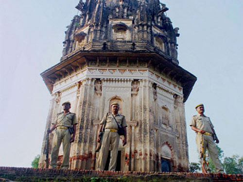 Policemen on duty during the excavation being carried out at Raja Rao Ram Bux fort in Unnao, Uttar Pradesh. PTI file Image