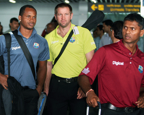 West Indies Cricketer Darren Bravo,Tino Best, Kemar Roach and Chris Gayle arrives in Kolkata Airport on Monday to play 1st Test Match against India. PTI Photo