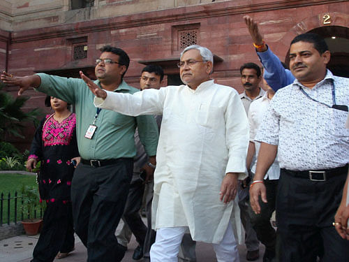 Bihar CM Nitish Kumar after meeting with Union Home Minister Sushil Kumar Shinde and Finance Minister P Chidambaram in New Delhi on Wednesday. PTI Photo