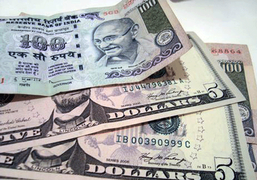 The rupee today fell 27 paise to 61.50 against the dollar on heavy month-end demand from importers for the US currency, which strengthened overseas after the Federal Reserve indicated it may taper its stimulus programme earlier than expected. PTI File Photo.