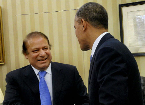 US President Barack Obama with Pakistani Prime Minister Nawaz Sharif at a meeting at the Oval Office of the White House in Washington on Wednesday. PTI Photo