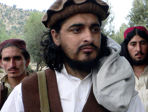 FILE - In this Oct. 4, 2009 file photo, Pakistani Taliban chief Hakimullah Mehsud, left, is seen during his meeting with media in Sararogha, a Pakistani tribal area of South Waziristan along the Afghanistan border. Intelligence officials say the leader of the Pakistani Taliban was one of three people killed in a suspected U.S. drone strike on Friday, Nov. 1, 2013.The officials say agents sent to the site of the attack in the North Waziristan tribal area Friday confirmed the death of the militant leader, Hakimullah Mehsud. AP Photo
