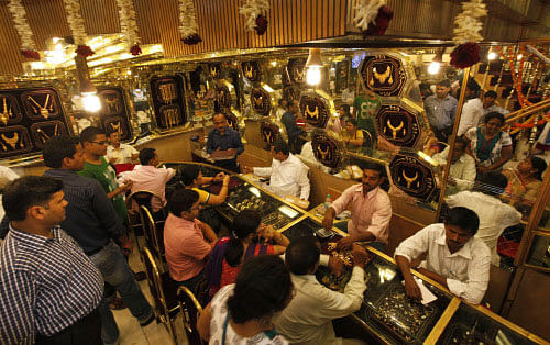 A scarcity of gold and high prices are pushing Indians to look to silver or diamond jewellery as alternative gifts this festive season, adding to the gloom in the gold trade after government measures to restrict imports. AP Photo.