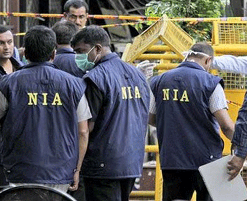 NIA officers probing a blast case.  PTI File photo