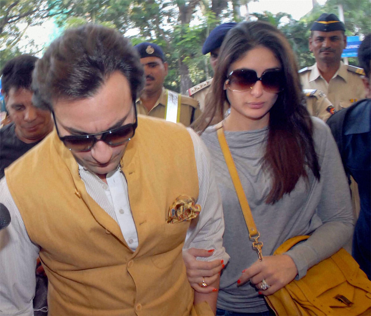 It's easy to be carried away by the glamour of the film industry but Bollywood actress Kareena Kapoor says she and her husband, actor Saif Ali Khan, are very much in touch with reality. PTI File Photo.