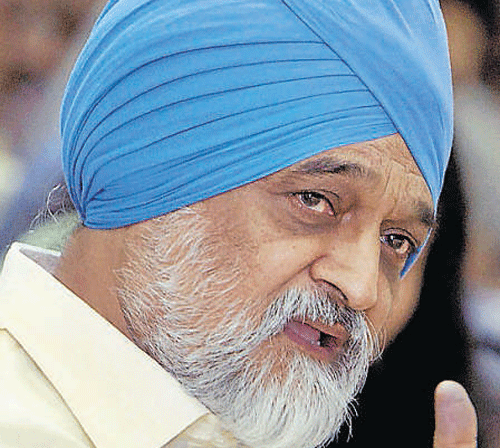 Planning Commission Deputy Chairman Montek Singh Ahluwalia (in pic) today said US investment bank Goldman Sachs should not be commenting on political matters. PTI File Photo