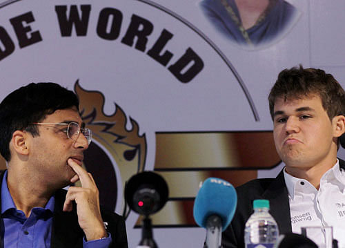 Viswanathan Anand of India and Magnus Carlsen of Norway at a press conference in Chennai on Saturday. PTI Photo