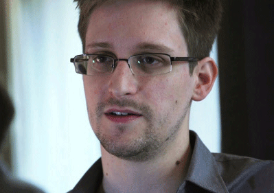 NSA whistleblower Edward Snowden, an analyst with a U.S. defence contractor, is interviewed by The Guardian in his hotel room in Hong Kong. Reuters
