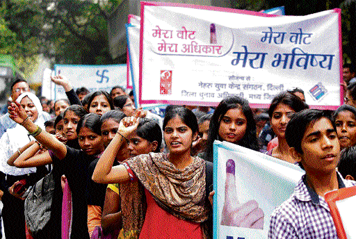 For a cause: Young girls participate in a voter awareness rally in New Delhi on Saturday. PTI