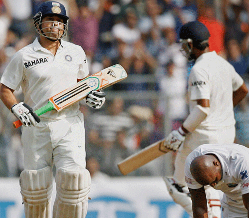 Master blaster Sachin Tendulkar takes a run against West Indies on Day 2 of the final Test match at Wankhede Stadium in Mumbai on Friday. PTI Photo