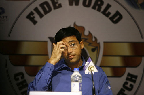 Reigning world chess champion India's Viswanathan Anand gestures as he interacts with the media after a match against Norway's Magnus Carlsen during the chess world championship match in Chennai, India, Tuesday, Nov. 19, 2013. Anand, 43, has the advantage of playing at home in India, where he is treated as a super star. AP photo