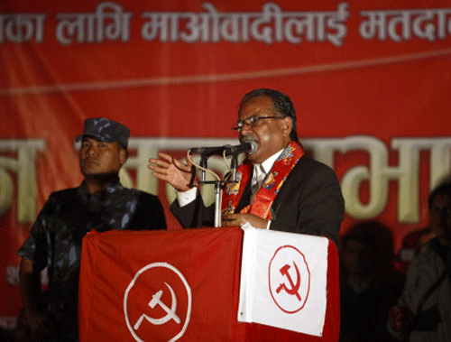 Chairman of the Unified Communist Party of Nepal (Maoist) Pushpa Kamal Dahal, also known as Prachanda, gives a speech during the party's election campaign in Kathmandu November 13, 2013. Nepalese are due to vote on November 19, for a constituent assembly meant to draw up a new constitution. REUTERS