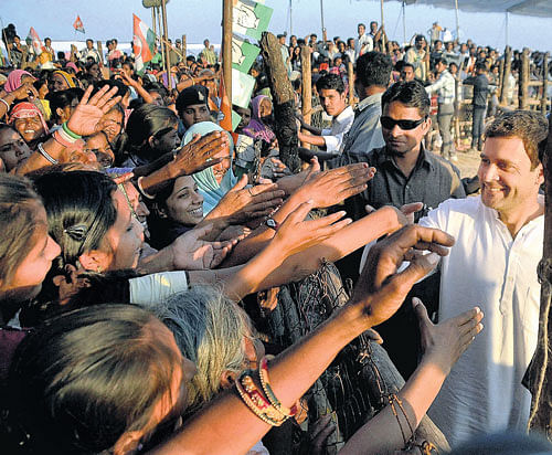 one among the crowd:  Congress Vice-President Rahul Gandhi meeting people at an election meeting in Malhargarh in Mandsaur district of Madhya Pradesh on Friday. Pti