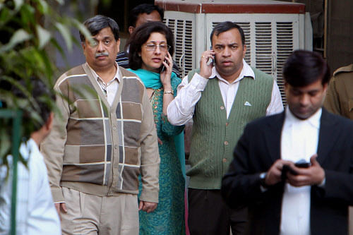 Family members of Nupur Talwar and Rajesh Talwar at the special CBI court in Ghaziabad on Monday. The court convicted the Talwar couple in murder case of their daughter Aarushi and domestic help Hemraj. PTI Photo