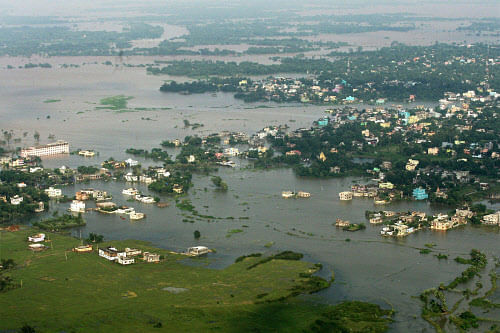 An aerial view of an area flooded by heavy rains in the aftermath of Cyclone Phailin in Balasore on Monday. PTI Photo