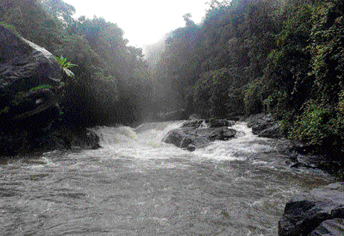 inaccessible (Above) The rumbling mountain stream, a lifeline for villagers (photo by the author);