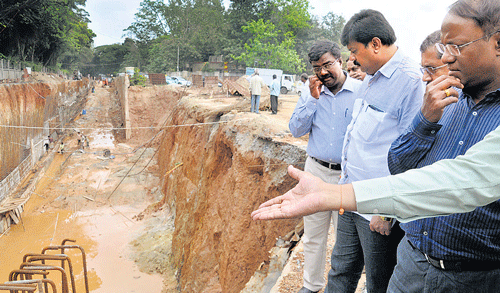 Half done BBMP Commissioner Lakshminarayana inspects the progress of the CNR Rao Circle underpass in Bangalore on Monday DH photo