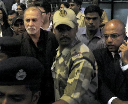 Tehelka magazine editor Tarun Tejpal spent the night at a police lock-up here with two murder accused and an anti-social person, after he was arrested by the Crime Branch. PTI File Photo.