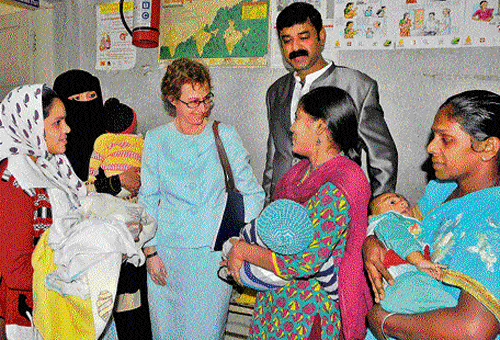 Goodwill: US Consul General Jennifer McIntyre speaks to patients during her visit to the Wilson Garden Maternity Hospital on Monday. dh photo