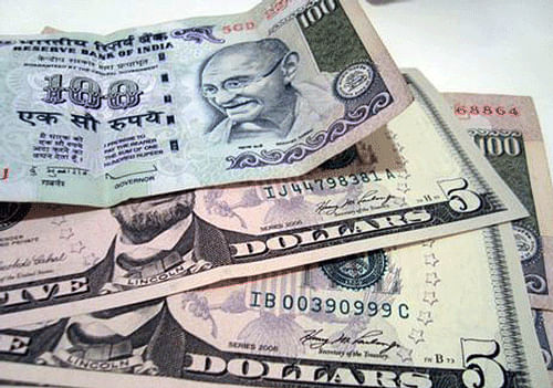The rupee opened at 62.30 per dollar as against the previous close of 62.31 at the interbank foreign exchange market. It dropped to 62.44 on fresh dollar demand from importers before ending at 62.36, a loss of five paise or 0.08 per cent. PTI file photo