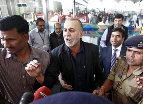 Tarun Tejpal, the 50-year-old founder and editor-in-chief of India's leading investigative magazine Tehelka, speaks with the media upon his arrival at the airport on his way to Goa, in New Delhi November 29, 2013. The man at the centre of a sexual assault scandal that has whipped India's media into a frenzy is no average Joe. Tejpal is one of India's most powerful journalists, and accusations that he sexually assaulted a colleague have uncovered what lawyers say is an often buried truth - such violence is common in the highest echelons of society. An investigation into Tejpal, who denies the accusations, has dominated headlines for eight days as news outlets follow every twist and turn. It comes days after similar accusations were made by an intern against a retired Supreme Court judge. REUTERS
