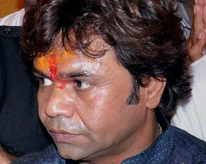 File photo of Bollywood actor Rajpal Yadav paying obeisance at Sri Krishna Janamasthan temple in Mathura in Aug 2013. The Delhi High Court on Tuesday remanded Bollywood actor Rajpal Yadav to 10 days judicial custody for concealing facts about a Rs.5 crore recovery suit filed against him and his wife by a Delhi-based entrepreneur. PTI Photo