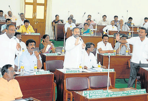 Corporators speak during the council meeting held at MCC premises, in Mysore, on Tuesday. dh photo