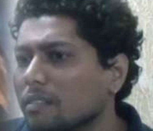 Girish Pote (in pic) chopped his wife's body into three pieces. TV Grab