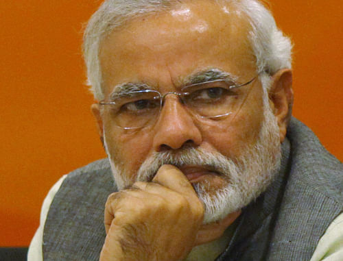 ''Communal Violence Bill is ill-conceived, poorly drafted and a recipe for disaster! My letter to PM opposing this bill,'' Modi wrote in his tweet. AP file photo