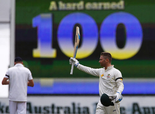 Australia's captain Michael Clarke celebrates his century during the second day of the second Ashes test cricket match against England at the Adelaide Oval December 6, 2013. REUTERS