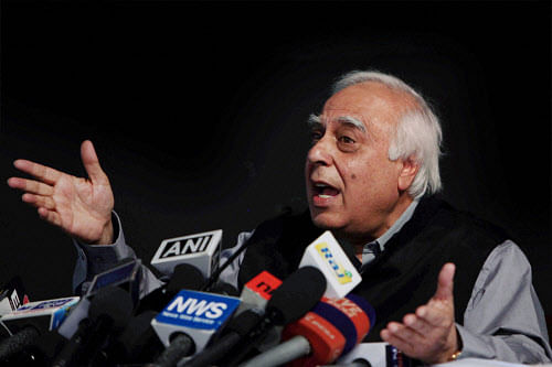 Union Telecom and Law Minister Kapil Sibal addresses a press conference in New Delhi on Thursday. PTI Photo by Subhav Shukla