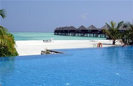 General view of a swimming pool at Olhuveli island in Maldives. Reuters.