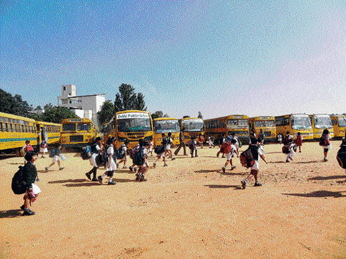 dangerous: The school buses parked in the playground in Delhi Public School (North).