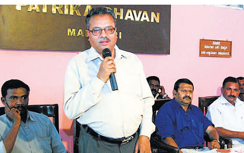 Expert U Basavaraju speaks at a seminar on status of tribals organised by Karnataka Rajya Adivasigala Samanvaya Samithi at Patrika Bhavan in Madikeri on Friday.