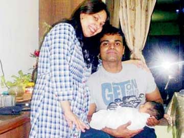 Sunil James and his wife Aditi with their son. File photo