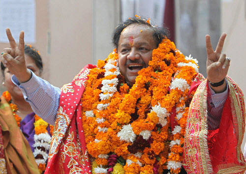 Delhi BJP CM candidate Harsh Vardhan arrives to file his nomination papers from Krishna Nagar constituency, in east Delhi. PTI Photo