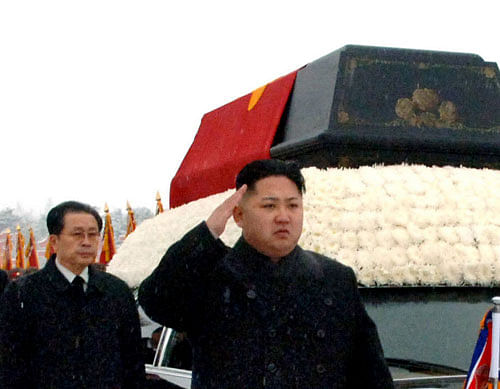 FILE - In this Dec. 28, 2011 file photo, North Korea's leader, Kim Jong Un, front center, is followed by his uncle Jang Song Thaek, vice chairman of the National Defense Commission, as he salutes beside the hearse carrying the body of his late father North Korean leader Kim Jong Il during the funeral procession in Pyongyang, North Korea. North Korea on Monday, Dec. 9, 2013, acknowledged the purge of leader Kim Jong Un's influential uncle for alleged corruption, drug use, gambling and a long list of other 'anti-state' acts, apparently ending the career of the country's second most powerful official. The young North Korean leader will now rule without the relative long considered his mentor as he consolidated power after the death of his father, Kim Jong Il, two years ago. AP Photo