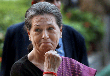 Congress President Sonia Gandhi after address the media at AICC in New Delhi on Sunday. PTI