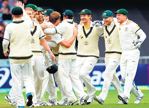 back with a bang: Australian players celebrate after winning the second Test at the Adelaide Oval on Monday. AFP