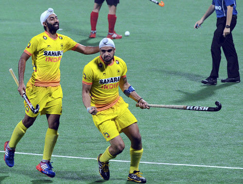 Indian player Gurjinder Singh celebrate the goal against Korea during the Men's Field Hockey World Cup in New Delhi on Tuesday. PTI Photo