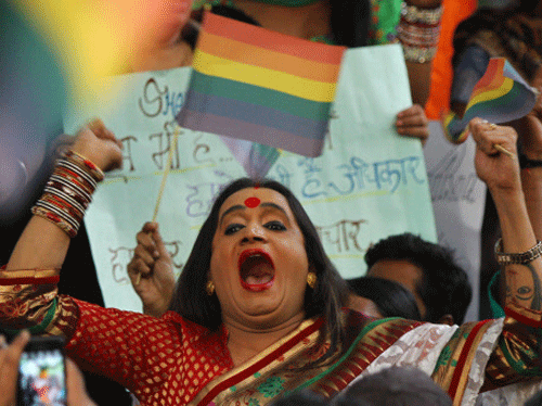 LGBT activists protest against Supreme Court's verdict on homosexuality, in New Delhi on Wednesday. The apex court on Wednesday set aside the decision of the Delhi High Court, which had in 2009 decriminalised sexual relation between persons belonging to same sex. PTI Photo