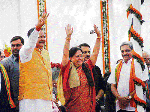 Movers and shakers: (From left to right) Delhi BJP leader Harsh Vardhan, third-time Chhattisgarh Chief Minister Raman Singh, Rajasthan chief minister-elect Vasundhara Raje and Goa Chief Minister Manohar Parrikar after Raman Singh's  swearing-in ceremony in Raipur on Thursday. PTI