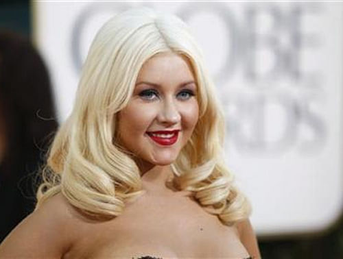 Pop star Christina Aguilera has reportedly lost weight due to her rigorous Reiki sessions. Reuters File Photo.