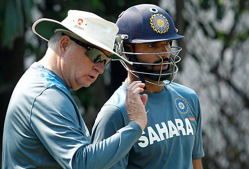 Indian cricket team coach Duncan Fletcher (L) with opener Shikhar Dhawan during a practice session . PTI File Image