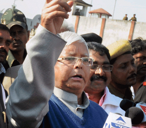 RJD chief Lalu Prasad interacts with the media outside Birsa Munda Central Jail, Hotwar in Ranchi after he was released on Monday. PTI Photo