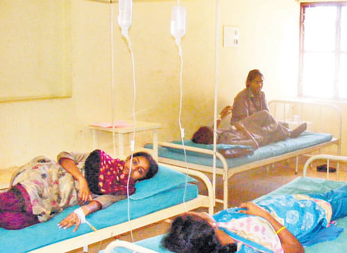 laid low: Students of NTTF under treatment at a hospital in Electronics City on Monday. dh photo