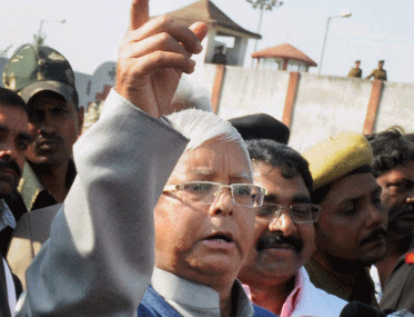 RJD chief Lalu Prasad interacts with the media outside Birsa Munda Central Jail, Hotwar in Ranchi after he was released on Monday. PTI Photo